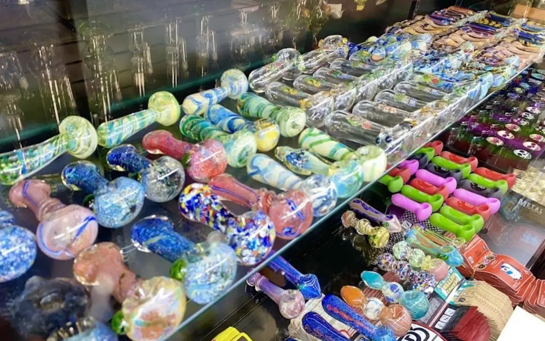 Glass hand pipes inside the former shop display counter